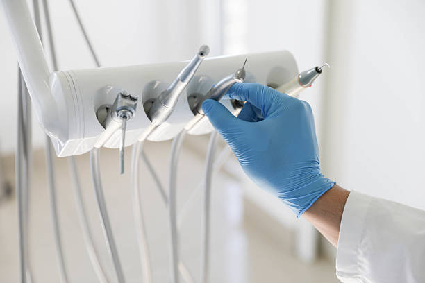 Professional Invisalign Clear Aligners technician working in New Baltimore, OH
